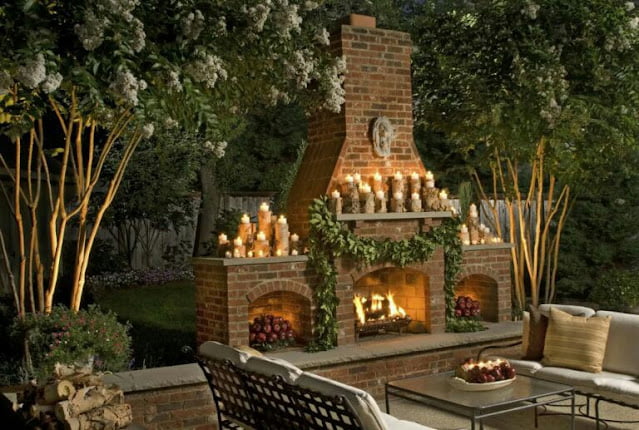covered outdoor living spaces with fireplace