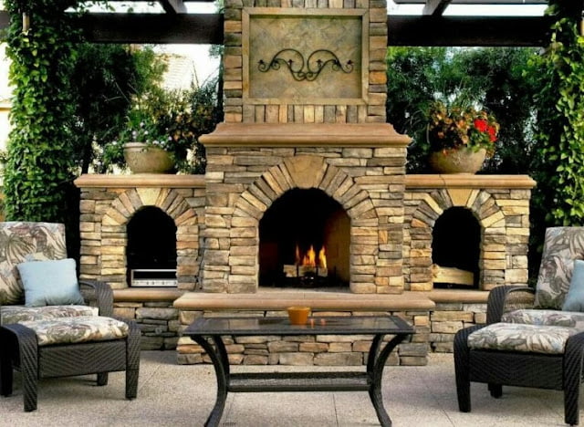 covered outdoor living spaces with fireplace