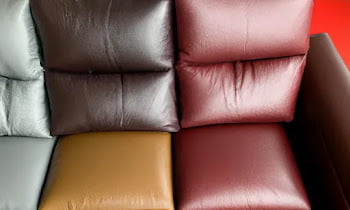 What colour goes with brown leather sofa