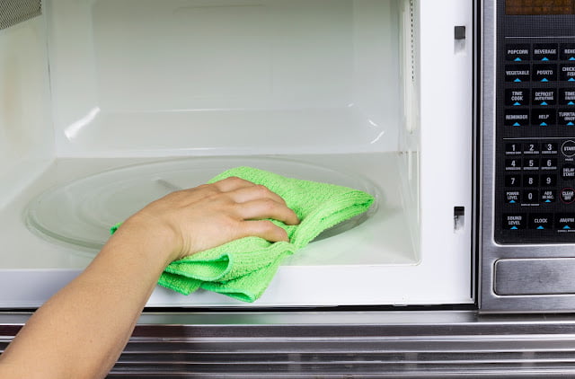how to get rid of burnt popcorn smell in microwave