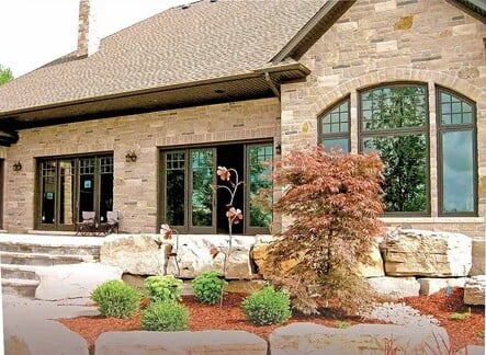 Gray decorative stone for finishing the exterior of the house