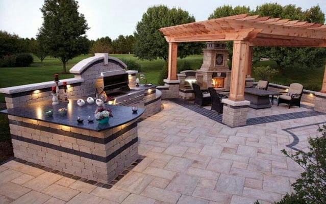 covered outdoor living spaces with fireplace