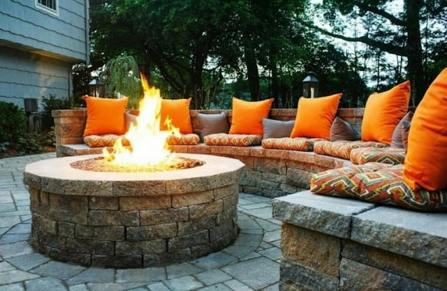 covered outdoor living spaces with fireplace