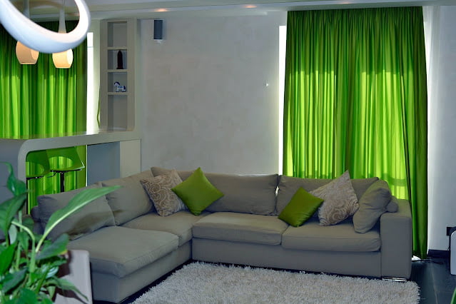 green and gray living rooms