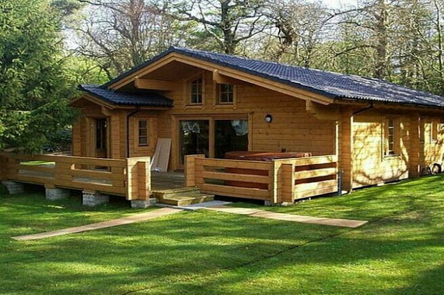 one story finnish house with a veranda