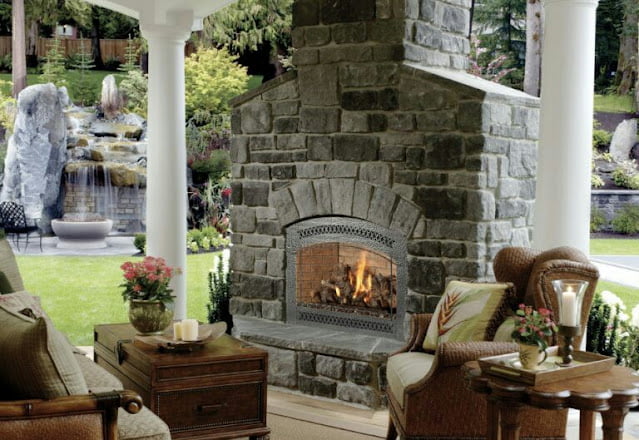covered outdoor living spaces with fireplace