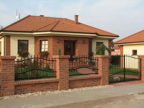 Wall fence design with exposed brick